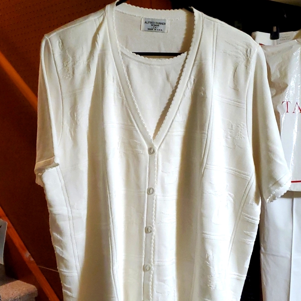 Womens 1 piece attched shell sweater set with buttons.